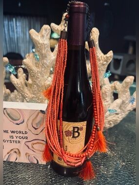 Boho Vibrant Coral Multi-Strand Seed
Bead & Tassel Statement Necklace
